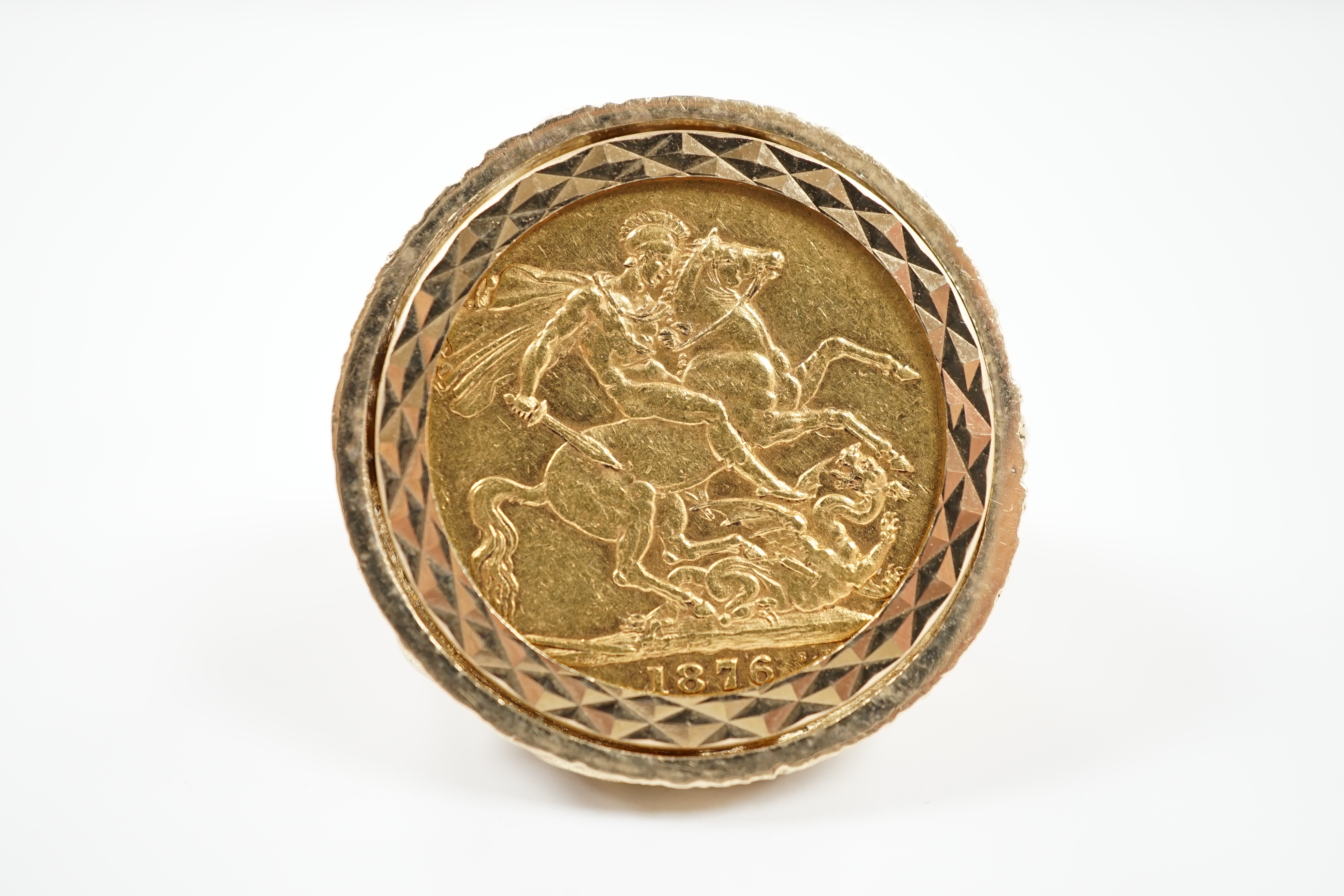 A Victorian 1876 gold full sovereign, now in a later 9ct gold ring mount, size P, 20.9 grams.